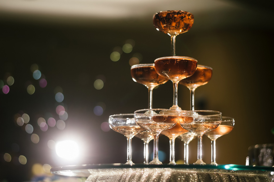 small tower of champagne's glass in wedding reception party